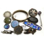 A Ruskin pottery brooch, two butterfly wing brooches, a Scottish hardstone brooch, various Victorian
