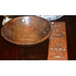 A large turned wood butter bowl and a gingerbread mould