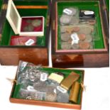 A quantity of coins, two Dunhill and one Ronson lighters, two costume jewellery brooches, three