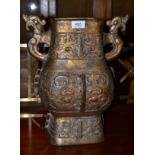 A large Chinese bronze archaic style twin handled vase