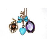 A 9 carat gold smokey quartz pendant, a purple paste set pendant on chain and a blue enamel heart