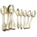 Set of four Irish silver dessert spoons, marked for Dublin, together with a set of five white