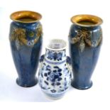 A pair of Royal Doulton stoneware vases and a Japanese blue and white vase (3)