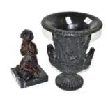 A 19th century French school bronze of a child praying upon a cushion, marble base; together with