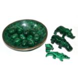 A group of carved and worked malachite