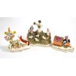 Three 19th century Staffordshire models including boy with dog and girl and boy with sheep