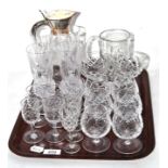 A group of glass, including Edinburgh and Stuart champagnes, silver plated mounted jug etc