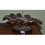 A bronze of horse and jockey