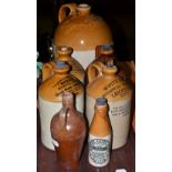 A group of 19th century advertising stoneware flagons and bottles