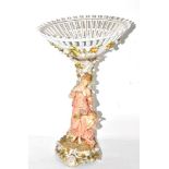 A late 19th early 20th Dresden porcelain centrepiece, the pierced floral encrusted bowl raised on