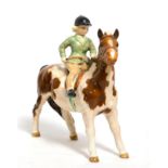 Beswick 'Girl on Pony', model No. 1499, Skewbald gloss Small hairline crack under glaze to girls