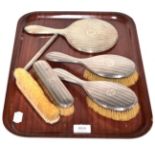 Silver dressing table set comprising four brushes, a hand mirror and a comb (a.f.)