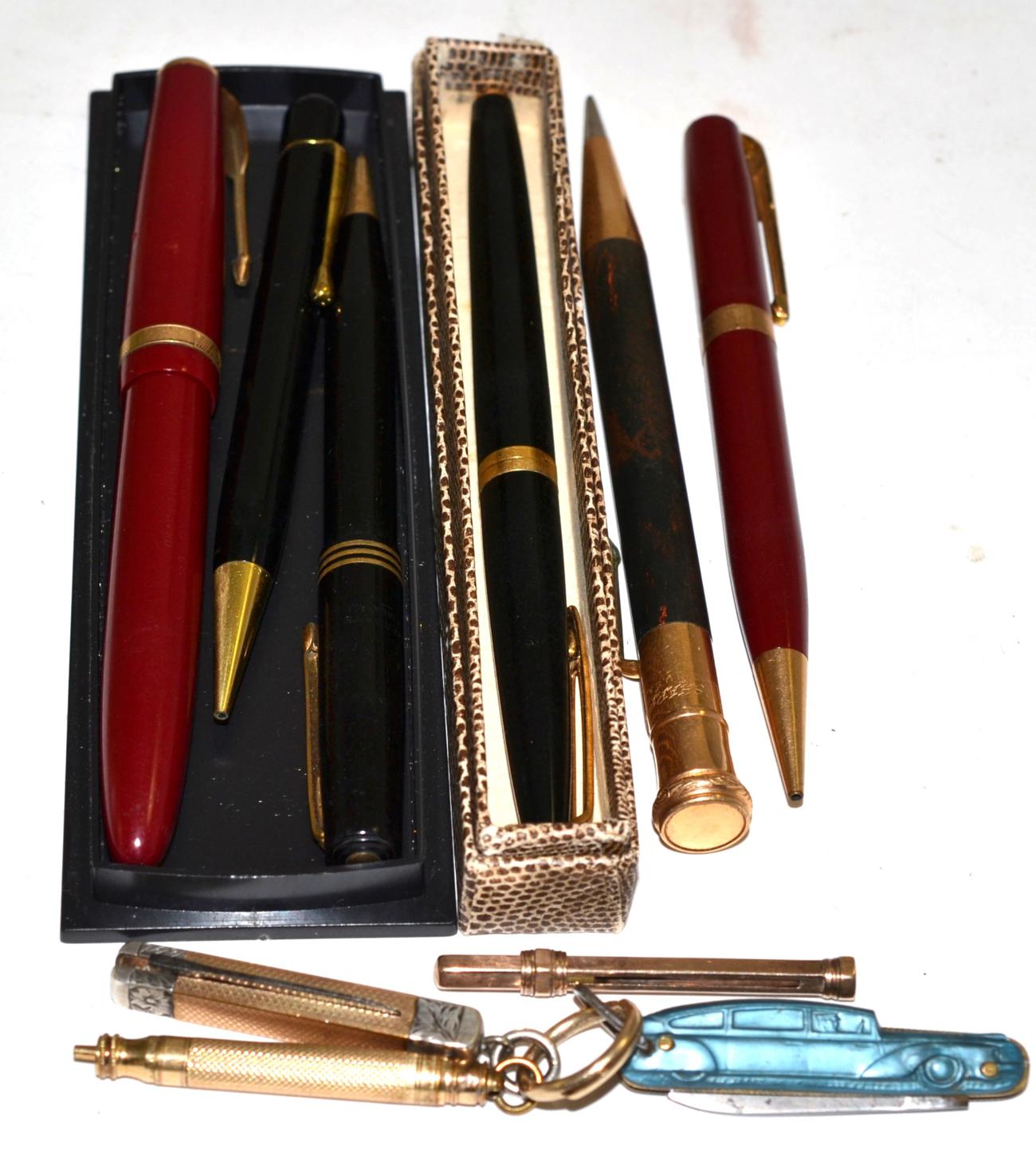 Six various fountain pens, pencils and similar; Sampson & Mordan 9ct gold cigar piercer; T Cross