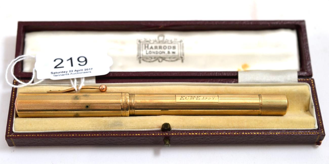 A 9ct gold fountain pen in a Harrods presentation box