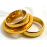 Two 18ct gold band ring and a 22ct gold band ring 5.7g - 18ct. 3.6g - 18ct. 5.5g - 22ct