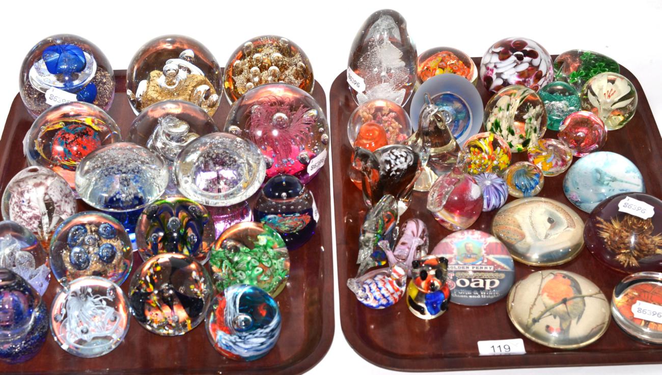 A collection of paperweights (on two trays)