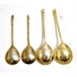 Two pairs of Russian silver spoons of similar design