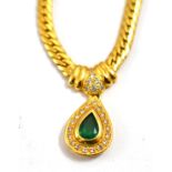 An emerald and diamond set pendant necklace, clasp stamped '750'13.74g gross