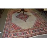 Mahal carpet, West Iran, the cream field centred by a stepped medallion framed by spandrels and