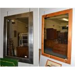 A pine framed mirror 5ft by 3ft and a silver coloured framed mirror 3ft by 2ft6''