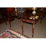 A 19th century mahogany D-end dining table