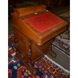 A Victorian walnut davenport desk, leather inset, gilt tooled, hinged stationary compartment