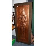 A large copper rubbing of a knight