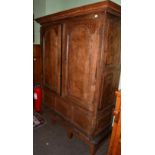 An 18th century panelled country linen press