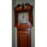 An oak and mahogany thirty hour longcase clock