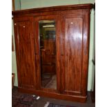 A Victorian mahogany three panel wardrobe