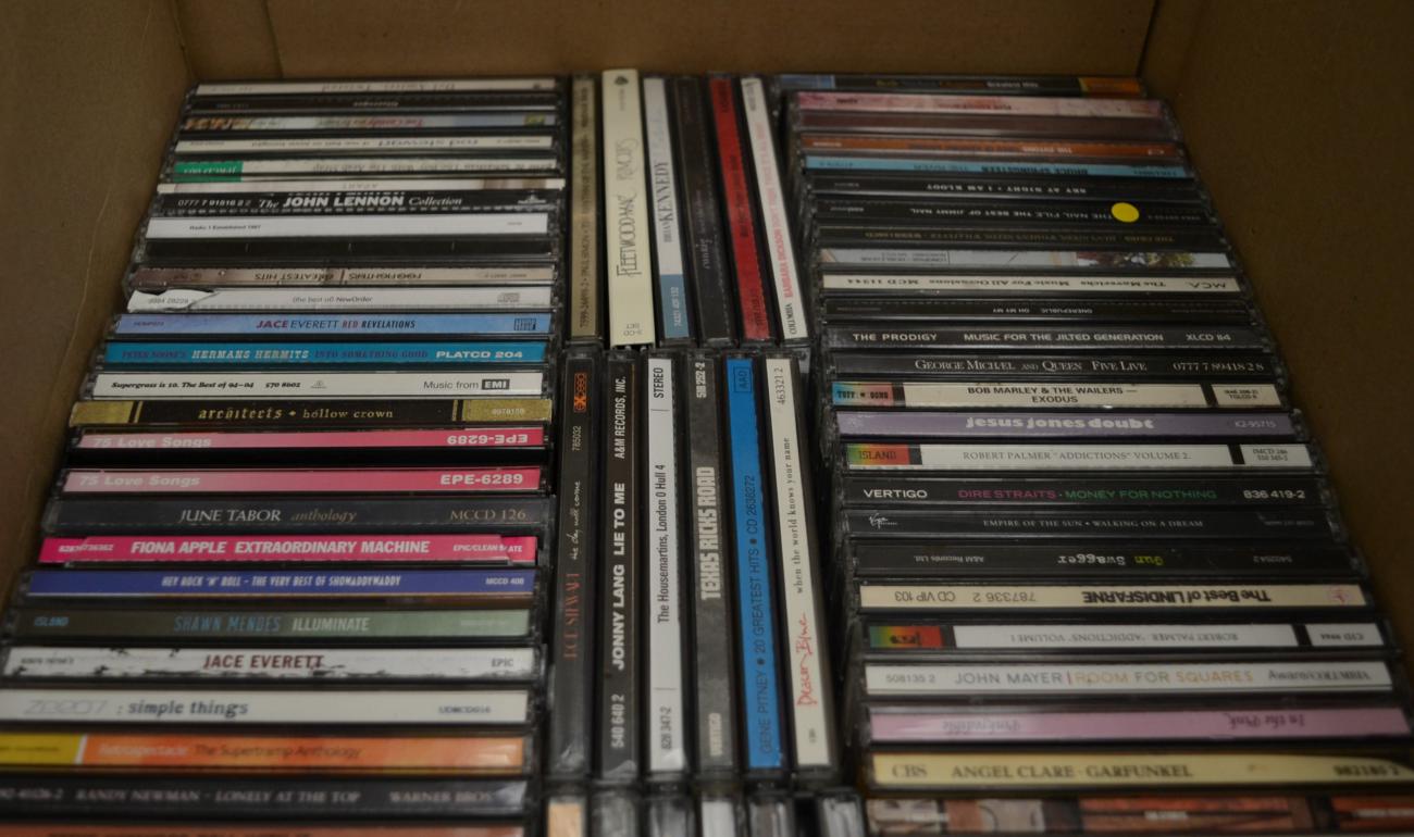 A mostly complete set of Now That's What I Call Music CD's together with an eclectic of other
