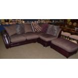 A Leather and Red Fabric Four-Seater Corner Sofa, with scatter cushions, maximum width 260cm; and