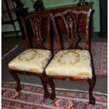 A set of eight Chippendale style mahogany dining chairs, including two carvers