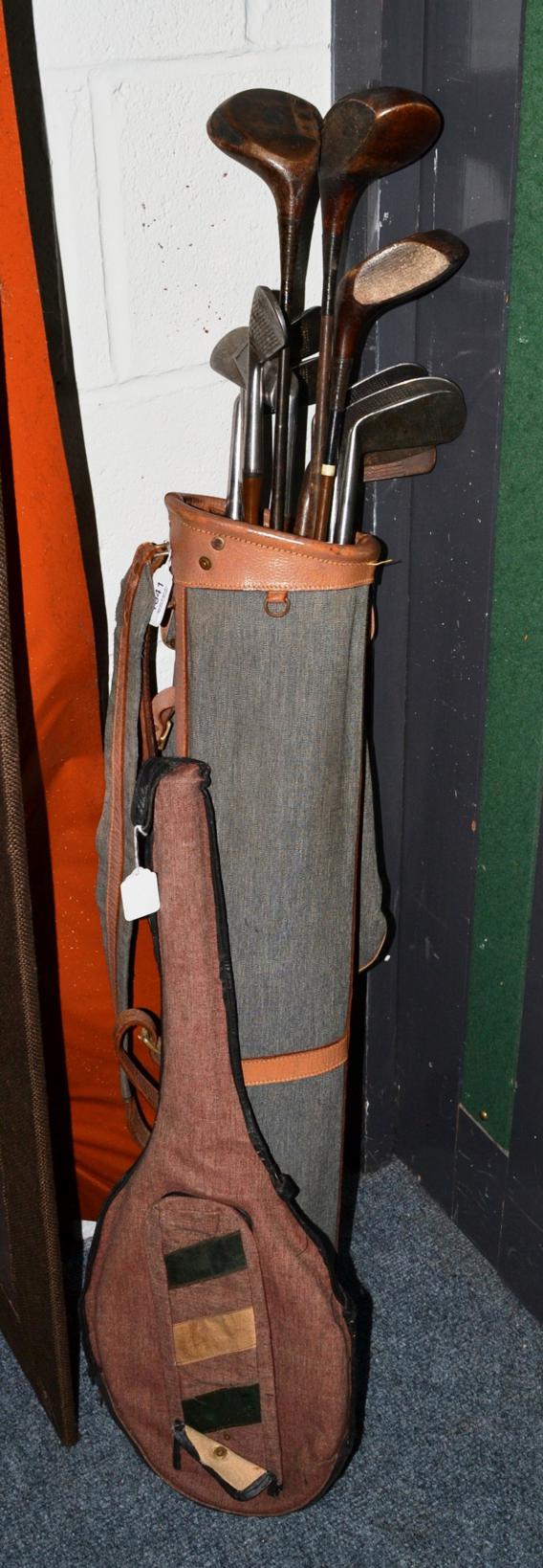 A collection of golf clubs including Anderson of St Andrews; with a tennis racket (13)