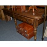 A large pine farmhouse plank top table, two drawers, turned baluster legs, 230cm in length