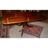 A 19th century mahogany tilt top pedestal breakfast table