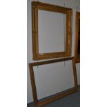 Two gilt picture frames Aperture - 110cm by 80cm, 71.5cm by 90cm.