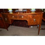 A 19th century checkered string inlaid mahogany bow fronted sideboard, with brass gallery