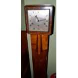 A small chiming longcase clock