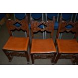 A set of six French oak dining chairs
