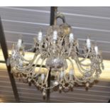 A Period style sixteen light lustre drop chandelier