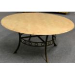 A Circular Pink Composition Marble Dining or Centre Table, raised on a wrought iron base with