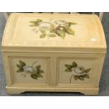 A Cream Painted Dome Top Chest of recent date, the lid and front panels painted with roses, 69cm