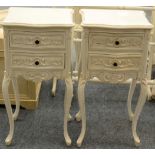 A Pair of Cream Painted Two Drawer Bedside Cabinets of recent date, of serpentine shaped form raised