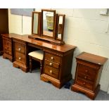 A Reproduction Mahogany Bedroom Suite by Willis & Gambier, comprising: a 6' sleigh bed, a pair of