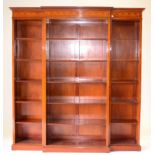 A Reproduction Mahogany and Marquetry Inlaid Breakfront Bookcase of recent date, with dentil cornice
