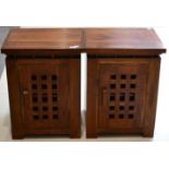 A Pair of Hardwood Bedside Cabinets of recent date, with grille doors, raised on block feet, 50cm by