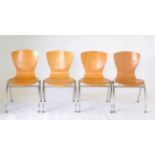 Four Beech and Chrome Tubular Stacking Chairs of recent date, 44cm by 46cm by 85cm