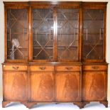 A Reproduction Mahogany Crossbanded and Boxwood Strung Breakfront Bookcase, the upper section with