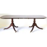 A Reproduction Mahogany, Satinwood Banded and Boxwood Strung Twin-Pedestal Dining Table in Regency